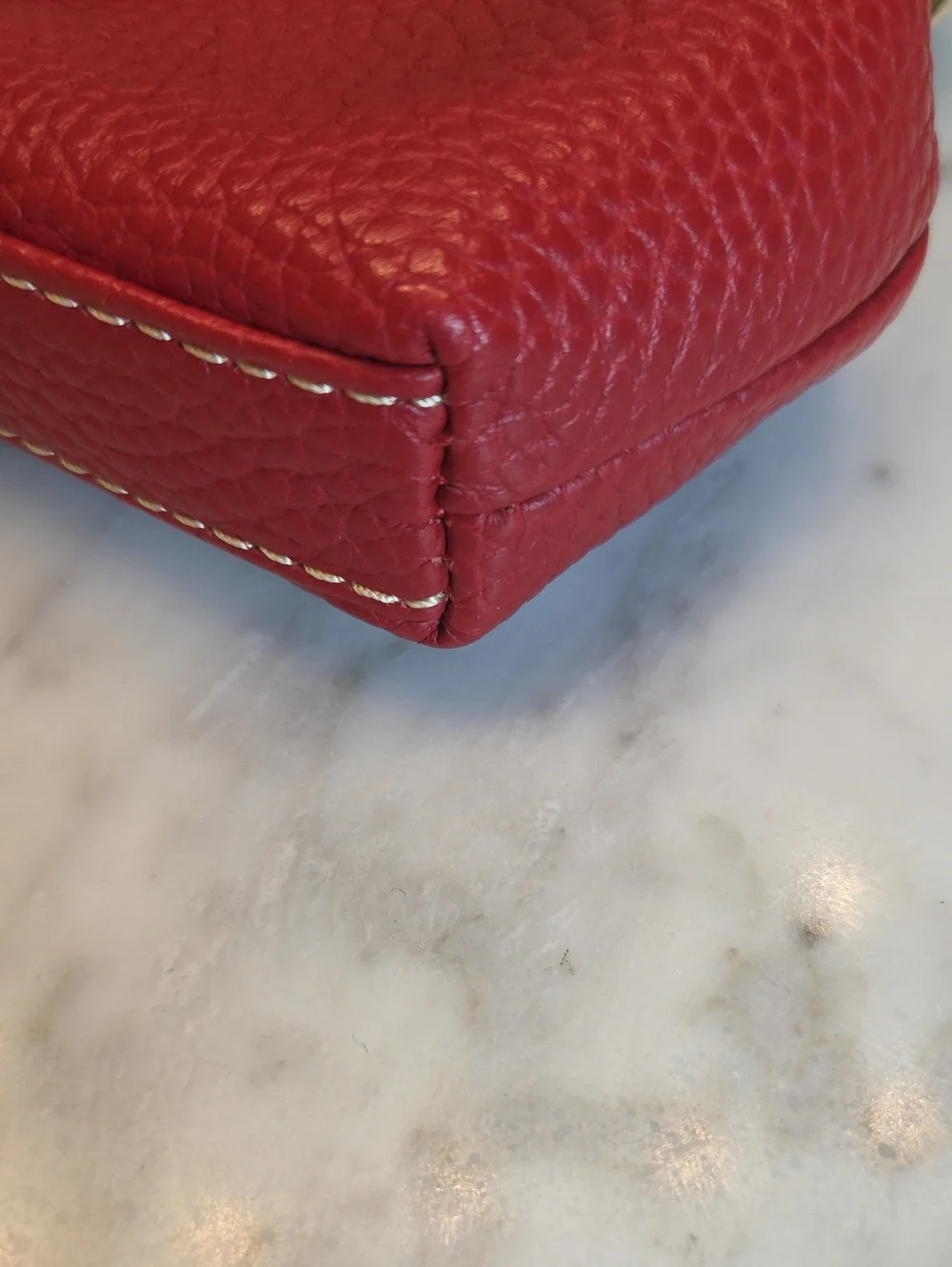 EUC Dooney & Bourke Red Pebbled Leather Kiss-Lock Coin Purse with Gold Plaque